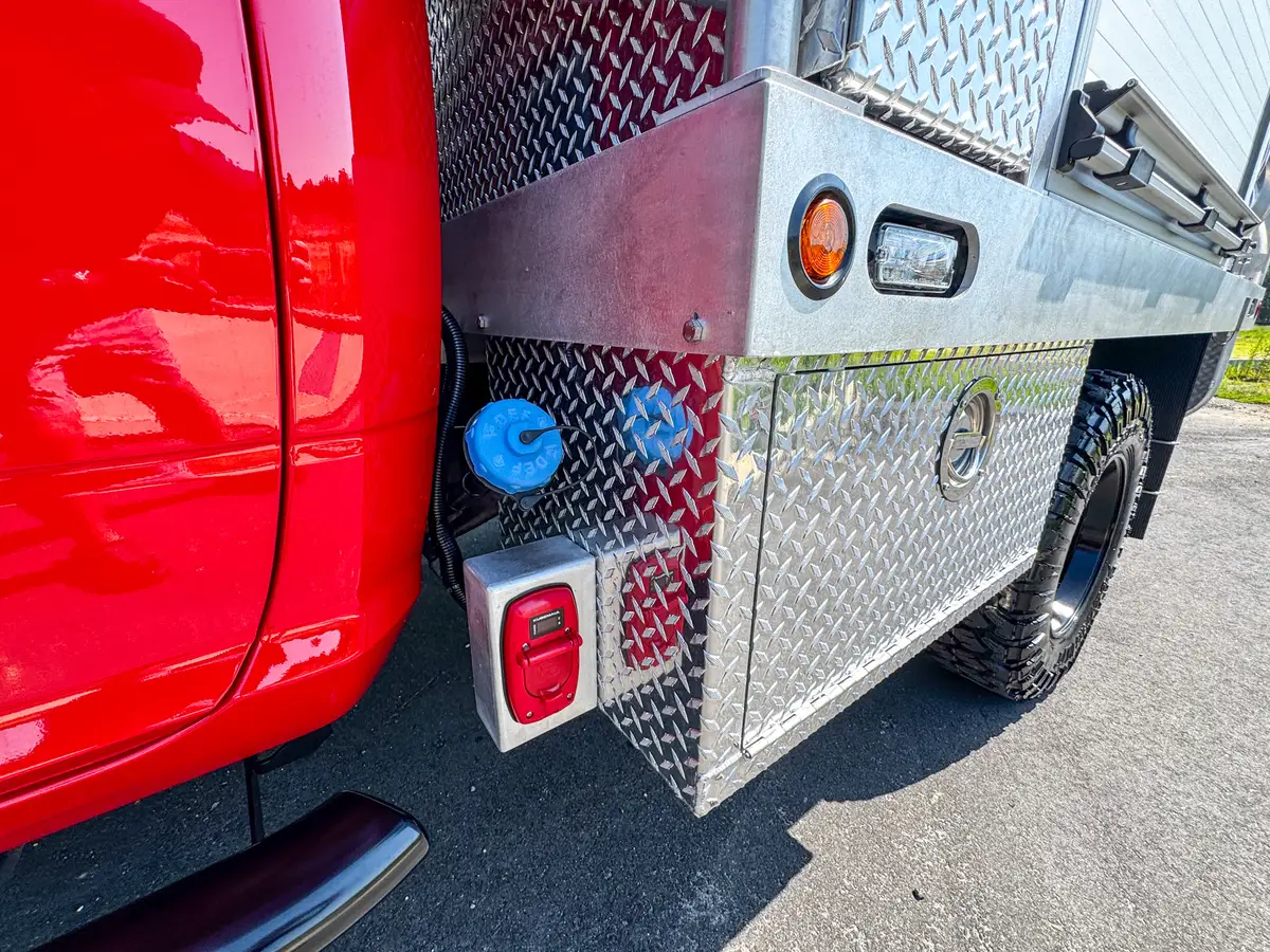 Open side roll-up compartment view with shelf and equipment bay.
